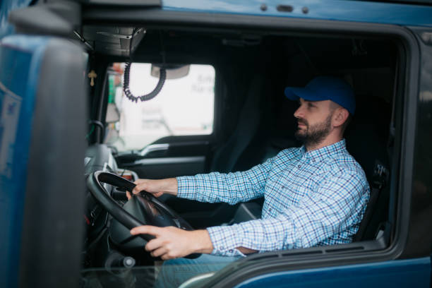 istock Truck driver driving his truck 1430761327