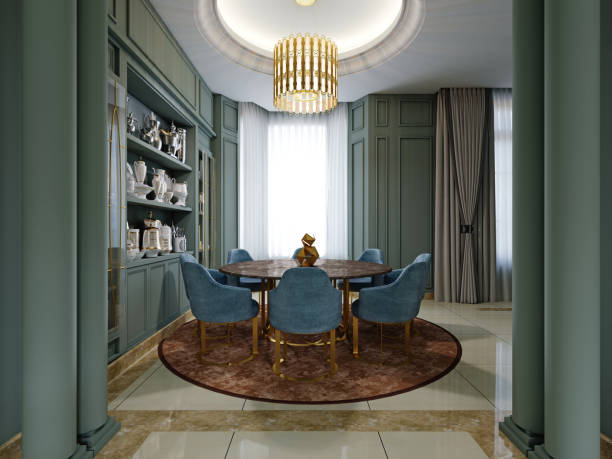 istock Dining room with a round table with blue chairs and a brown carpet in a green interior with shelves with crockery. 1430762638