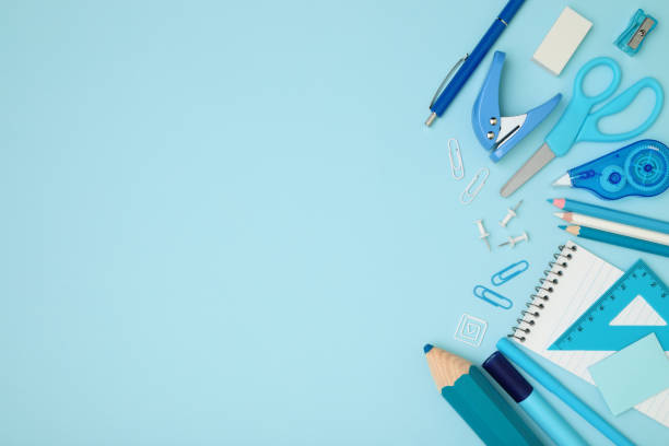 istock School and office supplies on blue background, template concept, top view 1430766513