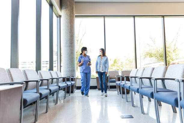 istock Doctor walks with the female patient 1430769030