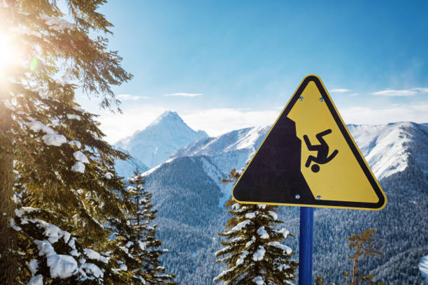 Yellow danger sign in mountains