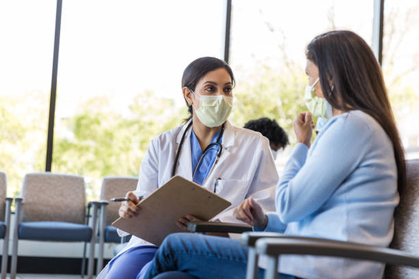 Doctor talks to the female patient