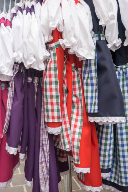 Innsbruck city center Austria . Typical Austrian dresses in souvenir shop for tourists in street.