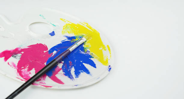 istock A palette with farbs and pens on a white background. Side view. Banner. Space copy. 1430780513