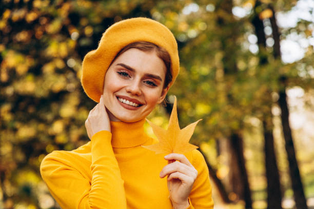 istock Beautiful woman enjoying autumn 1430780896