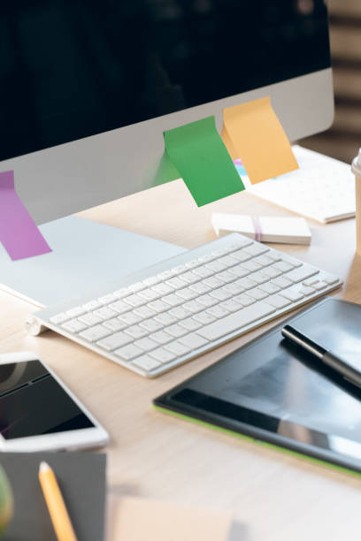 istock Office table with smartphone and supplies close up, office interior 1430783237