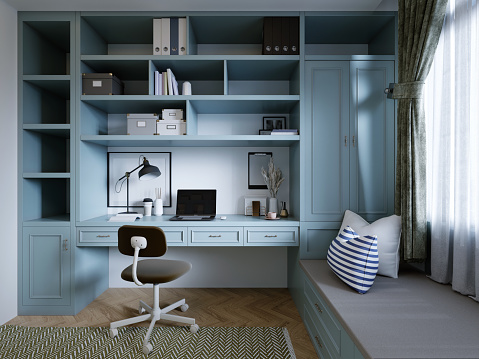 Workplace of a teenager in a children's room with light blue furniture with shelves and a work table. 3D rendering.