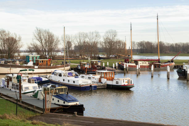 Small harbor on the river Nederrijn in the fortified town of Wijk bij Duurstede. Small harbor on the river Nederrijn in the fortified town of Wijk bij Duurstede in the Netherlands. lek river in the netherlands stock pictures, royalty-free photos & images