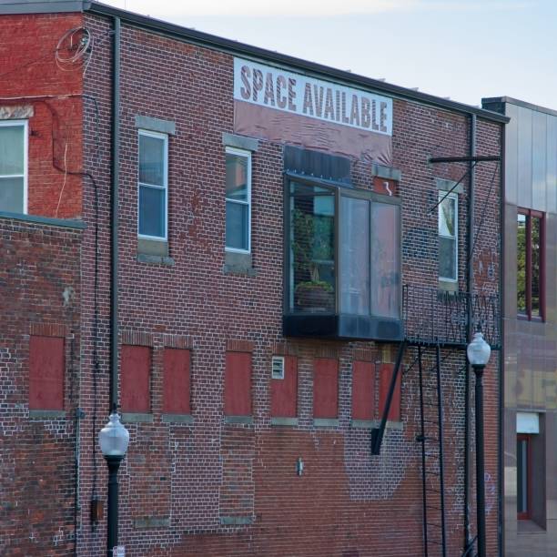 istock Solarium attached to old mill building apartment exterior wall 1430791361