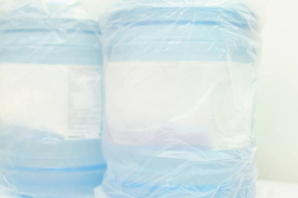 Water bottles in a row collection isolated on a white background