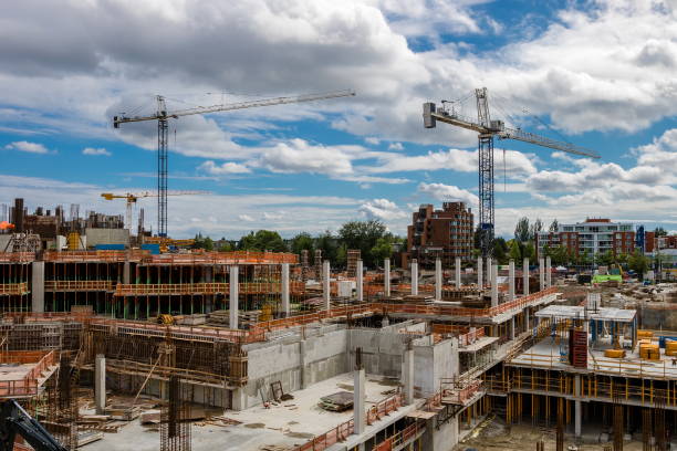 istock Construction Site with Cranes on the Background of Cloudy Sky 1430805468