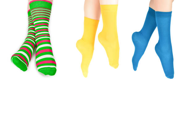 istock Woman in blue socks isolated on white background. Top view. 1430811866