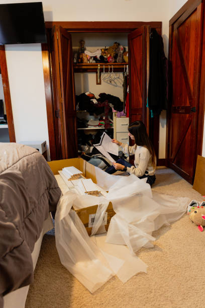 istock Receiving large package at front door from online order sequential 1430812523