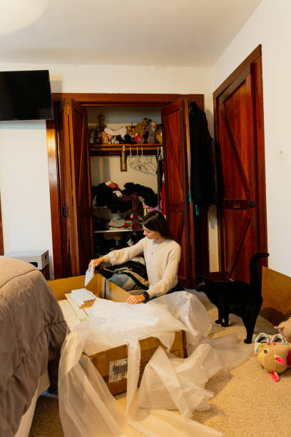 istock Receiving large package at front door from online order sequential 1430812524