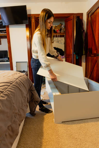 Receiving large package at front door from online order sequential