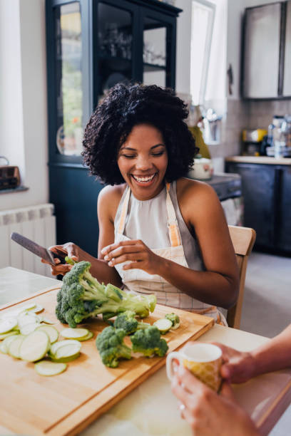 istock A Happy Mixed-race Female Having Fun While Preparing Lunch 1430813228