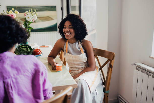 istock A Happy Mixed-race Female With Apron Relaxing At Home While Enjo 1430813507