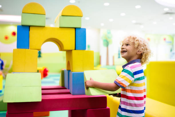istock Kids play. Construction toy blocks. Child toys 1430813675