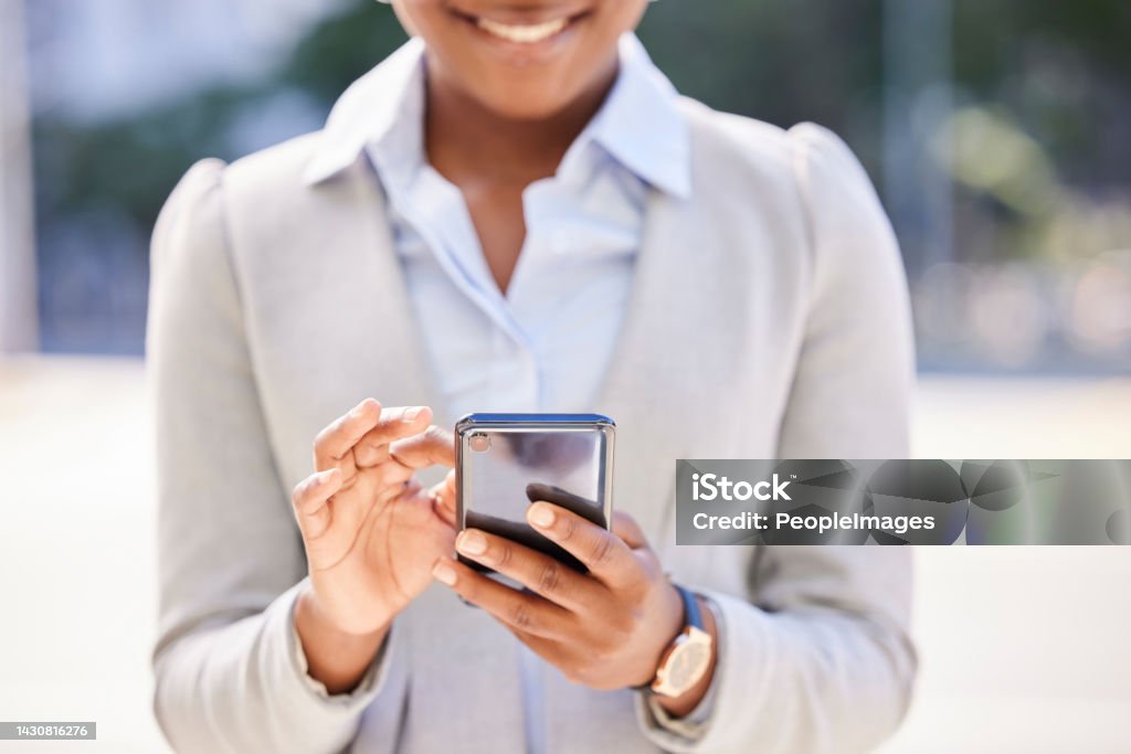 Networking, contact and online woman with phone reading WhatsApp business communication, email or success for job opportunity in urban city street. Corporate professional hands typing on smartphone 5G Stock Photo