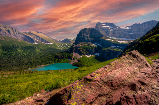 The lake, falls, mountain and glacier are all named after George Bird Grinnell, an early American conservationist, explorer, and founder of the Audubon Society.  Grinnell was so inspired by the scenery during his first trip to the area in 1885 that he spent the next two decades working to establish it as a national park.  In 1896 Grinnell was one of the three commissioners to sign the treaty with the Blackfeet Indians that transferred ownership of the land that would become Glacier National Park.