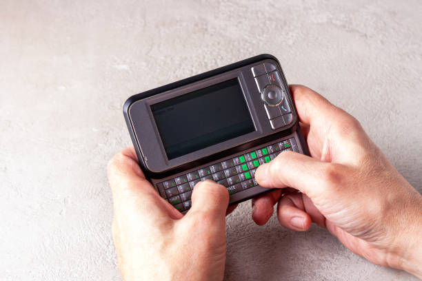 istock man typing on vintage slider screen 1430824456