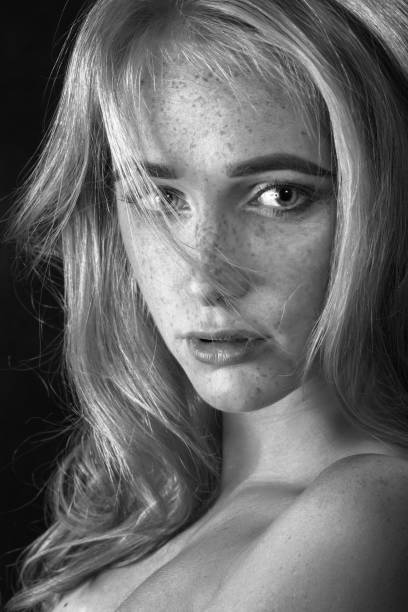 istock woman with freckles 1430826048
