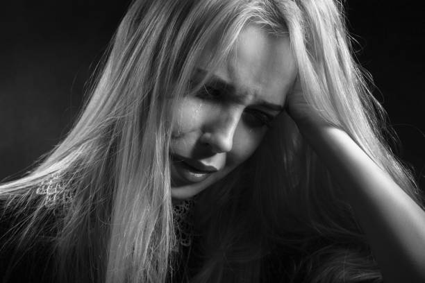 istock blond woman crying 1430838890