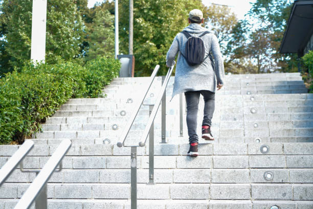 Free Stock Photo of Man Walking Up Stairs With Backpack | Download Free ...