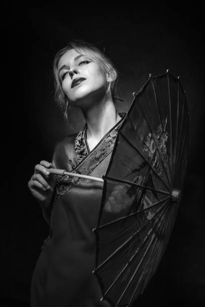 istock girl with umbrella 1430847760