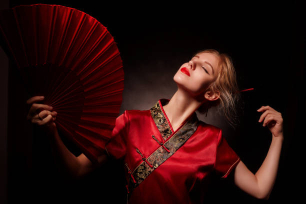 A young Asian woman wearing traditional Chinese Hanfu clothing.