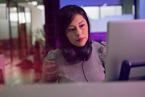 Female Programming Engineer Is Working Developing Codes For A New ...