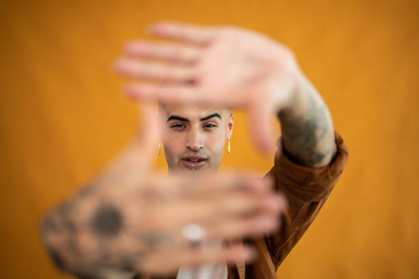 Portrait of a young man gesturing