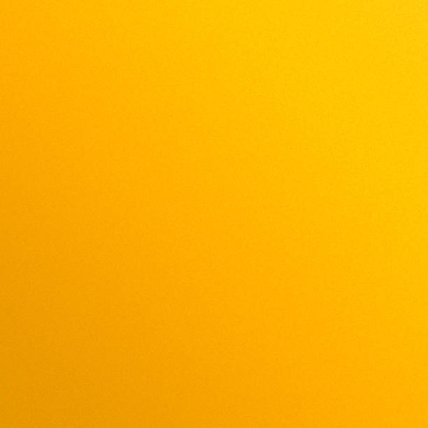fundo de grão texturizado de laranja amarela abstrato - orange wall textured paint - fotografias e filmes do acervo