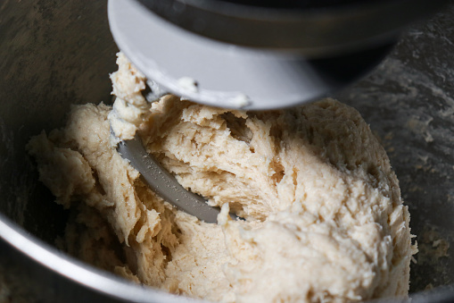 close up of making dough in the kneader
