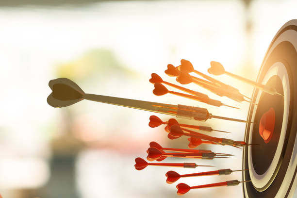 istock Darts target. Success Business Concept. Target hit in center by arrows, future technology Success Business Concept Target hit in center by arrow Darts target. Success Business Concept 1430896455