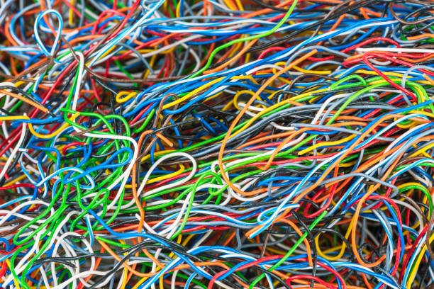 istock Multicolored telecommunication electrical cables with white sliding power 1430898259