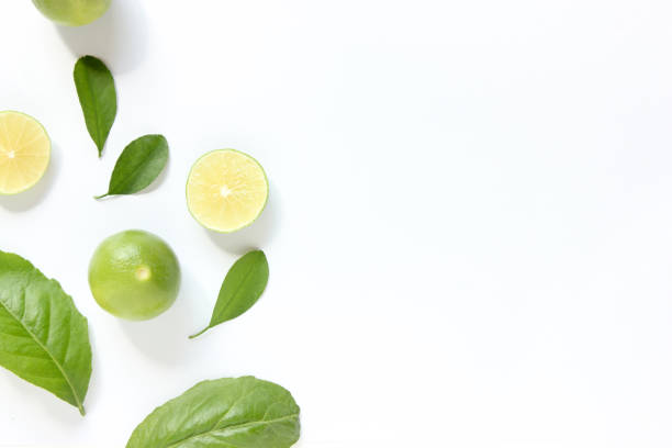 istock Flat Lay Fresh limes on white background, top view. 1430907197