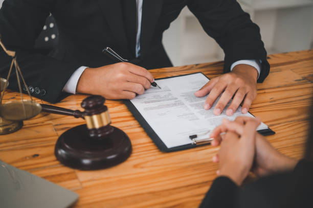 istock Lawyers give advice about judgment, agreements, justice Customer 1430911966