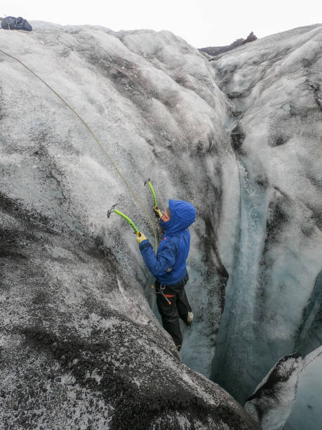 istock Mountaineer training for glacier crevasses rescue 1430917978