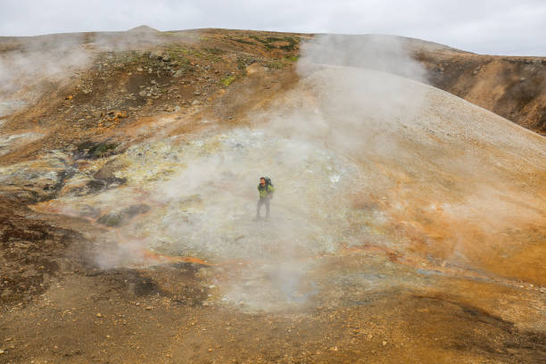 istock Solo hiker walks along volcanic trail in Iceland 1430919706
