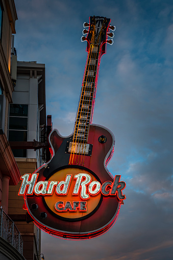 Niagara Falls, Canada - August 15, 2022: View along a street in Niagara Falls in Canada. Here is the entrance of the famous Hard Rock Cafe with the guitar as a sign.