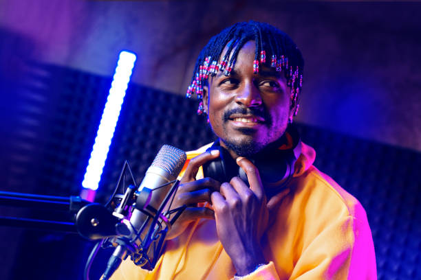 istock Young African performer recording his new track in recording studio 1430931210