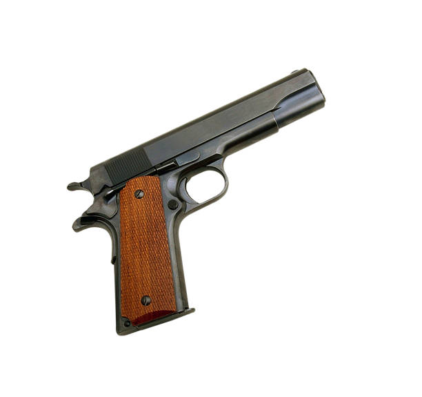 istock Closeup of pistol isolated on white background 1430938109