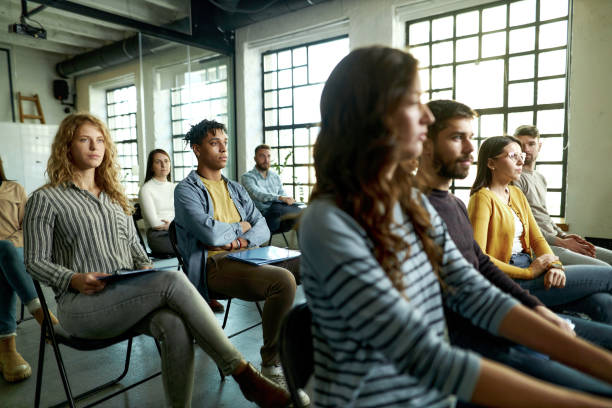 istock Young freelancers having a seminar in board room. 1430939740