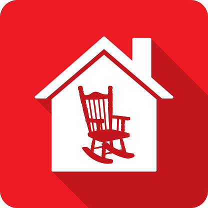 Vector illustration of a house with rocking chair icon against a red background in flat style.
