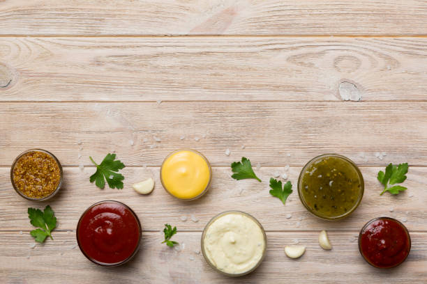 istock Many different sauces and herbs on table, flat lay top view. sauces with spices healthy concept 1430941503