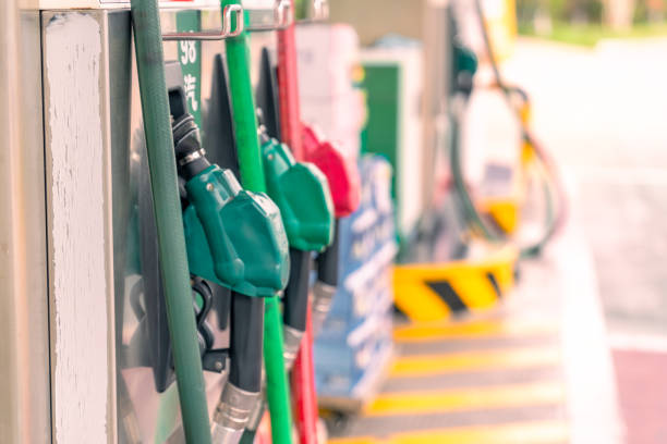 istock Refueling gun for refueling car at gas station 1430941696