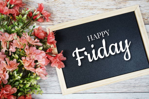 istock Happy Friday text on blackboard with flower bouquet decoration 1430949981