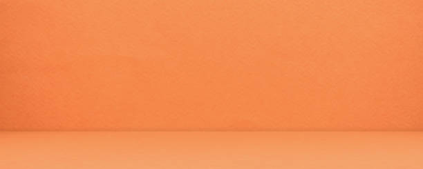 Orange Empty Counter Light Bright Smooth Cement Wall Room Background stock photo