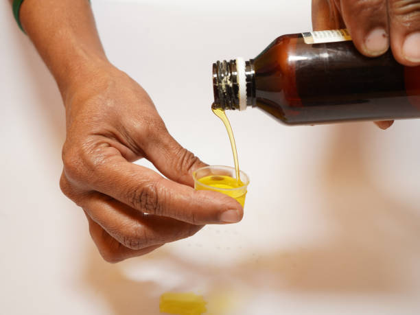 istock Cough syrup or cold medicine 1430955193